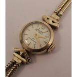 Accurist, a lady's 9 carat gold mechanical wrist watch on a bracelet, 10g gross excluding movement