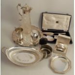 A collection of silver plated items, to include trays, basket, flatware, claret jug, lighters,