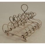 A Scottish silver seven bar toast rack, decorated with hearts, Edinburgh 1814, maker John Heron,