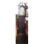 An Antique oak cased long case clock, with arched gilt metal dial and silvered chapter ring,