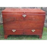 A Georgian mahogany mule chest, with plain rising lid, fitted with two drawers below, raised on