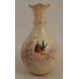 A Locke and Co Worcester blush ivory vase, decorated with a bird on a gilt branch, height 5.