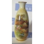 A Royal Worcester vase, decorated to the front with a cottage and flowers by Stinton, shape number
