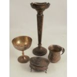 Four pieces of hallmarked silver, to include a trumpet vase, a jewellery box, a mug and a