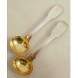 A pair of Scottish provincial silver fiddle pattern mustard spoons, with gilt wash bowls and