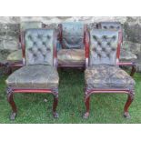 A set of five 19th century mahogany framed dining chairs, with green leather cloth button backs
