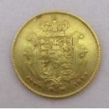 A gold sovereign style disc , weight 4.2g, possibly used as gaming token in the 19th century