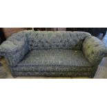 A Victorian deep button back Chesterfield, with drop end, width 84ins