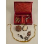 A cameo brooch, a pair of onyx drop earrings, and other jewellery items, in a red jewellery box