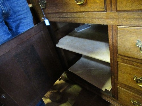 A Georgian cupboard dresser, with an associated close boarded Delft rack over three frieze - Image 7 of 7