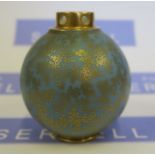 A Royal Worcester vase, with pierced gilded neck, the bulbous body decorated with gilded seaweed