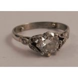 A platinum single stone diamond ring, the transitional cut stone of approximately 0.75 carats,