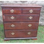 A 19th century oak chest, of two short over three long drawers, width 37.5ins x depth 21ins x height