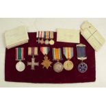 A group of World War 1 medals, comprising an unnamed Military Cross and Trio, awarded to