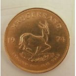 A 1974 gold krugerrand, weight 34g