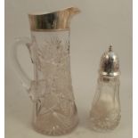 A cut glass jug, with hallmarked silver rim, height 10ins, together with a hallmarked silver mounted