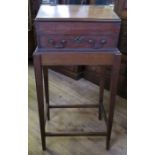 A Victorian mahogany clerk's desk or bible box, with sloping front and drawers below, raised on a