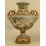 A Royal Worcester vase, decorated with swans to a powder blue ground by C H C Baldwyn, with