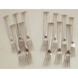 Seven Elkington & Co silver dessert forks, with scroll terminals, Birmingham 1900, weight 8oz,