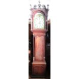 An Antique mahogany cased long case clock, the painted arched dial with sun and moon phased