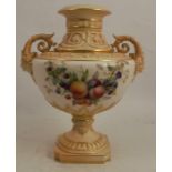 A Royal Worcester pedestal vase, with blush ivory neck, handles and pedestal foot, the body