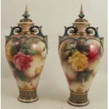 A pair of Royal Worcester Hadley covered vases, with pierced covers and scroll handles, the bodies