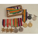 A World War 2 medal group, comprising Africa Star, Italy Star, '39/'45 Star and defence medal,