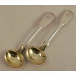 A pair of Scottish silver mustard spoons, with gilt wash bowls, engraved with an initial, Glasgow