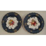A pair of Royal Worcester dishes, decorated with fruit and flowers by E Phillips af, dated 1925,