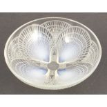 A Lalique opalescent glass bowl, decorated in the Coquilles pattern, etched R Lalique, diameter
