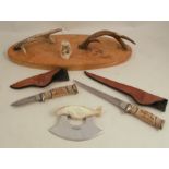 Two Mark Knapp custom knives, of Fairbanks Alaska, numbered 61002 and 61003, each with wood and musk