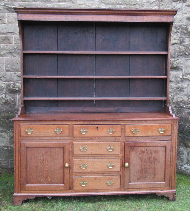 A Georgian cupboard dresser, with an associated close boarded Delft rack over three frieze - Image 2 of 7