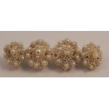 A seed pearl brooch, designed as four oval clusters