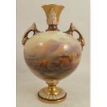 A Royal Worcester twin handle pedestal vase, decorated with Highland cattle in landscape with