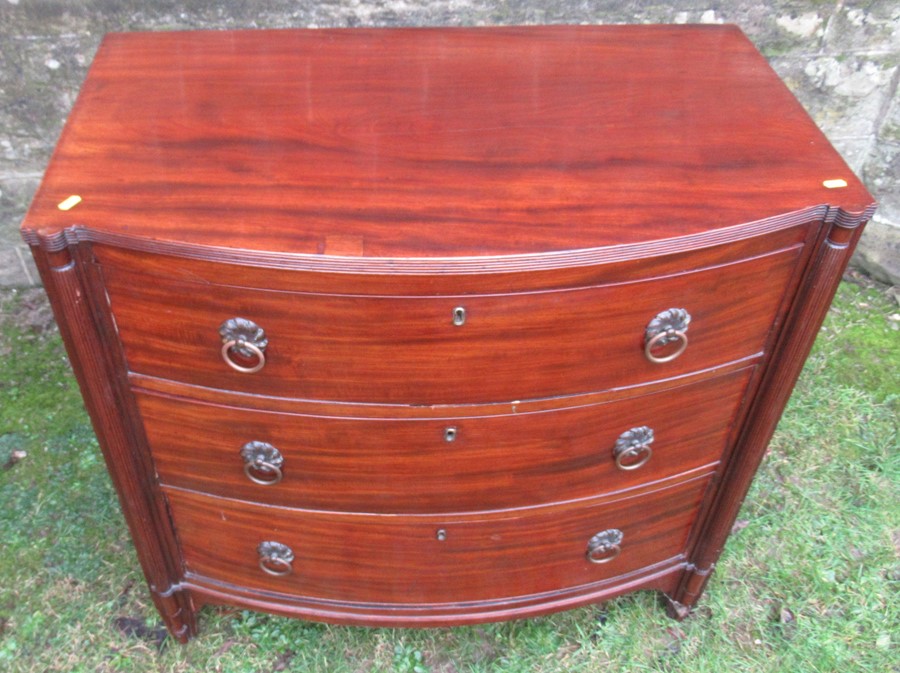 A bow front chest, of three long drawers flanked by reeded columns, width 37ins x depth 22ins x - Image 2 of 4