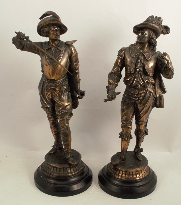 A pair of large spelter figures, of men in cavalier dress, height 20.5ins