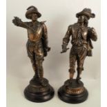 A pair of large spelter figures, of men in cavalier dress, height 20.5ins