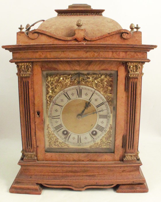 A walnut and mahogany cased mantel clock, the chiming movement stamped Lenzkirch, with gilt dial and