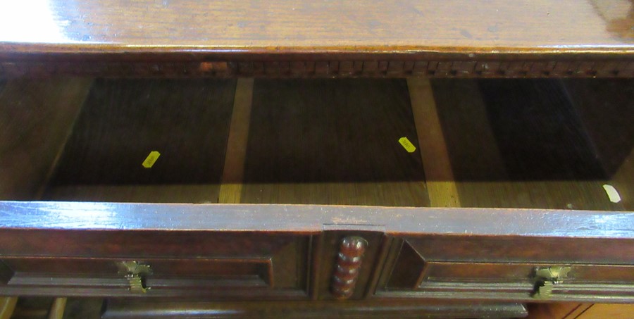 A 17th century style oak moulded front and bobbin moulded chest, of three long drawers, raised on - Image 3 of 3