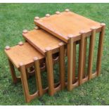 Possibly Cotswold School by Fred Foster, a nest of three rectangular oak tables, width 18.75ins,