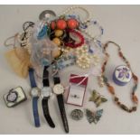 A collection of costume jewellery and watches, to include necklaces, brooches, bangles etc
