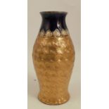 A Royal Doulton pottery vase, of baluster form, the body with gilt scrolling decoration, height 4.