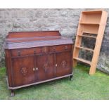 An oak sideboard, fitted with drawers over cupboards, width 52ins, height 42ins, depth 20ins, not