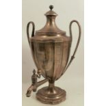An 18th century Georgian silver samovar, in the Adam style, the panelled body decorated with