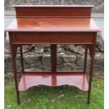 An Edwardian mahogany side table, with satinwood inlay, standing on four square tapering legs,