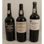 Three bottles of vintage port, 1985 Churchill Vintage, 2005 Fonseca Porto late bottled, and 1988