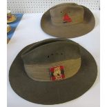 Two felt bush hats, with cloth badges, impressed 1942 to the interior