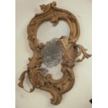 A 19th century gilt frame wall mirror, the a-symmetrical c scroll frame decorated with leaves and