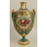 A Royal Worcester vase, decorated with hand painted fruit by Chivers, to a green ground, shape