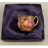 A Royal Worcester miniature jug, decorated with fruit to a mossy background by Bowman,
